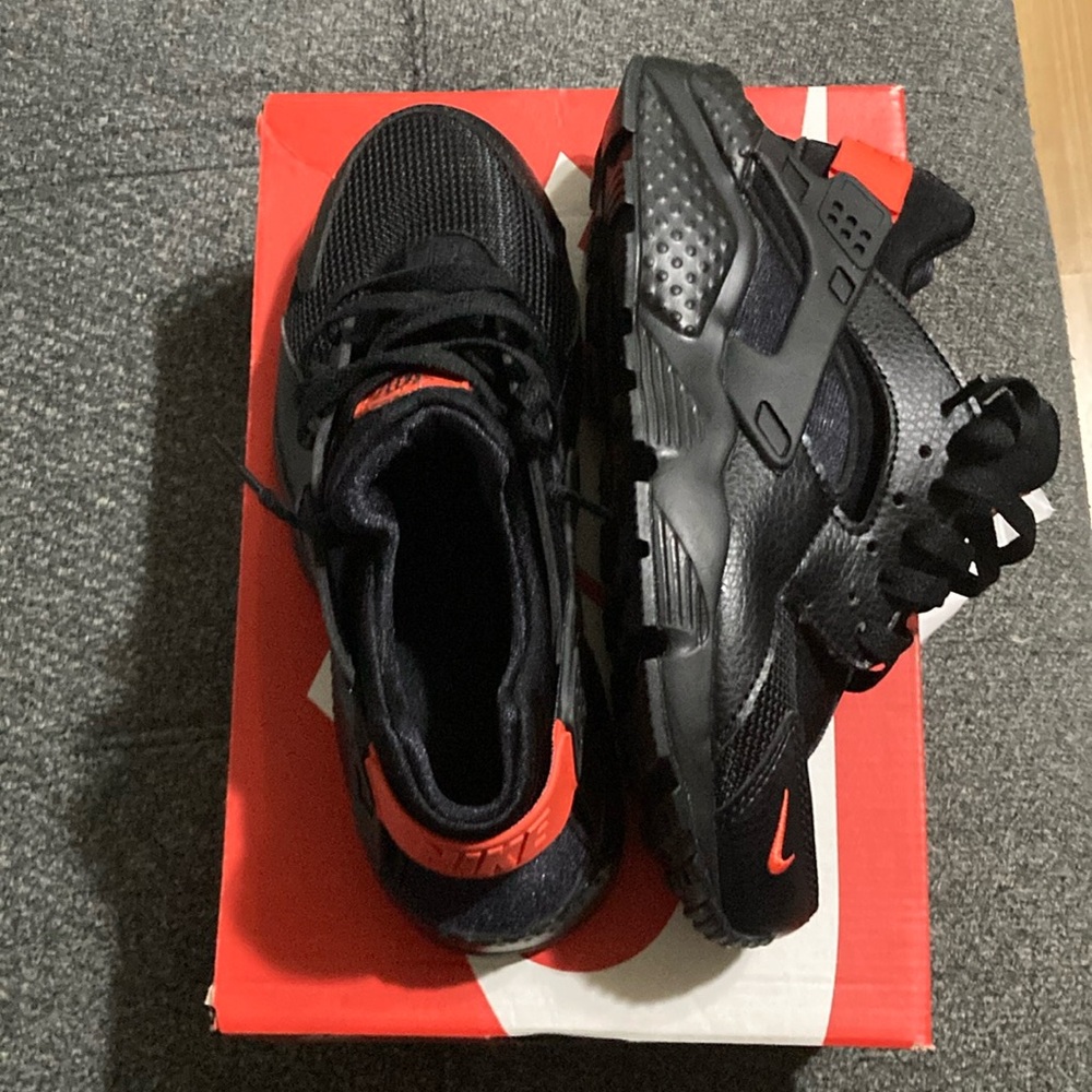 Brand new sz 6y Nike huaraches black and habenero red. Asking $90 obo